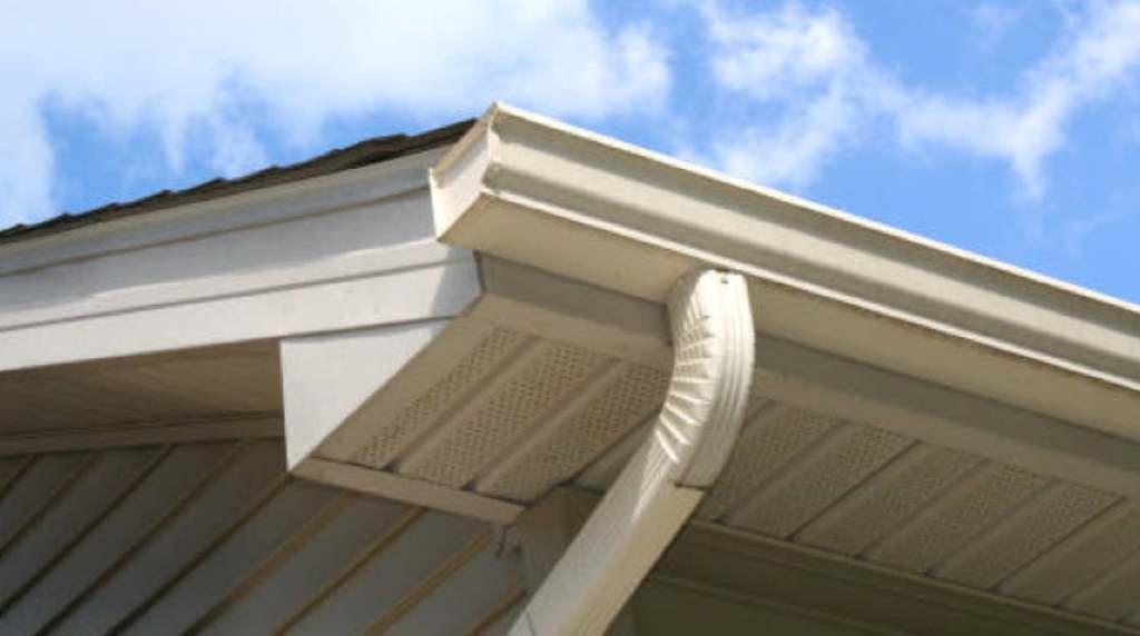 Close-up of aluminum gutter and downspout system on a residential home in South Central Tennessee