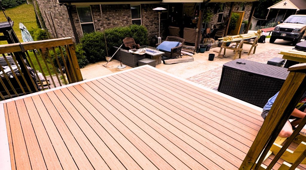 Modern deck patio with seating area built for backyard entertainment in South Tennessee