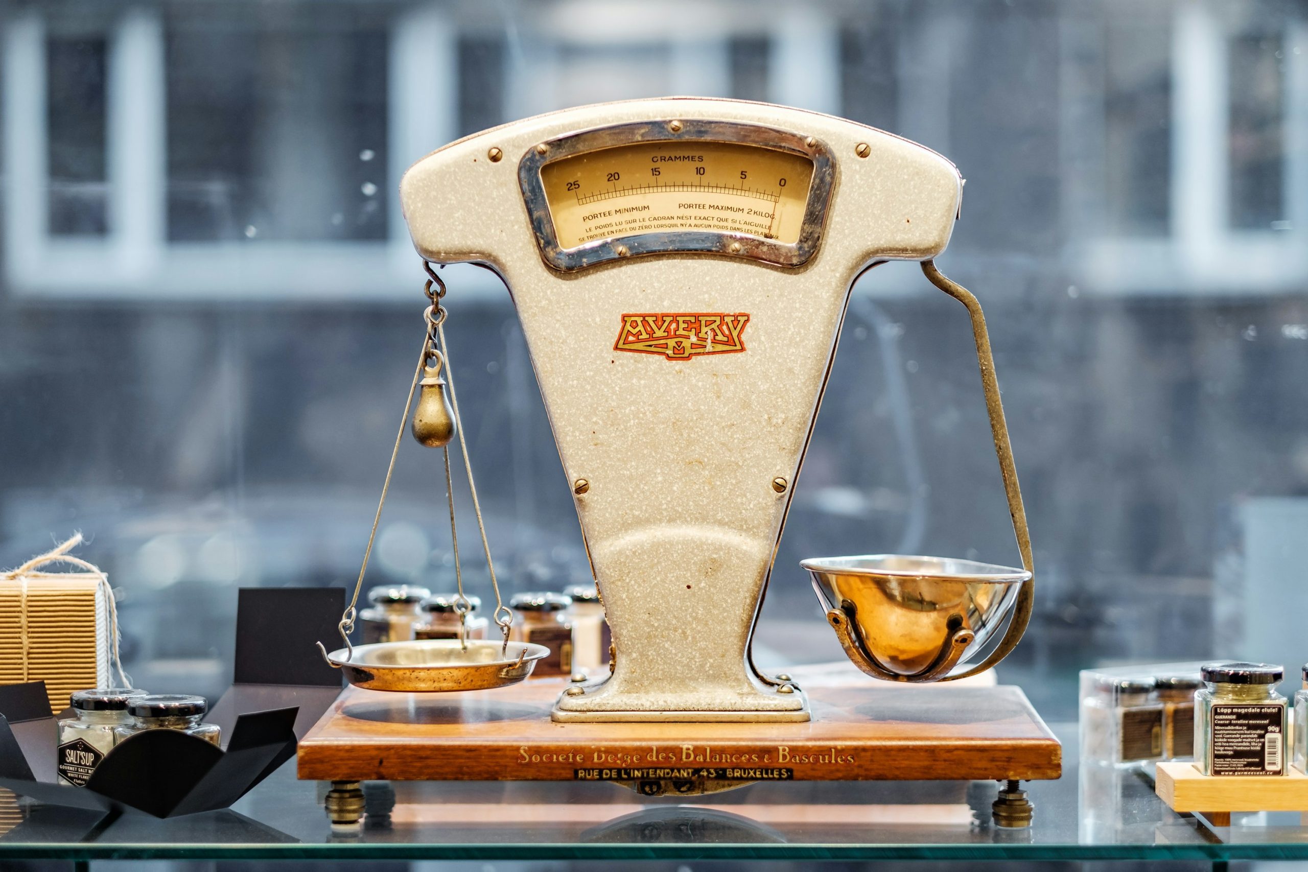 Home warranty comparison image showing a balance scale for weighing options.